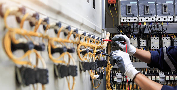 Professional Electrician technician working in Mashpee Neck, MA